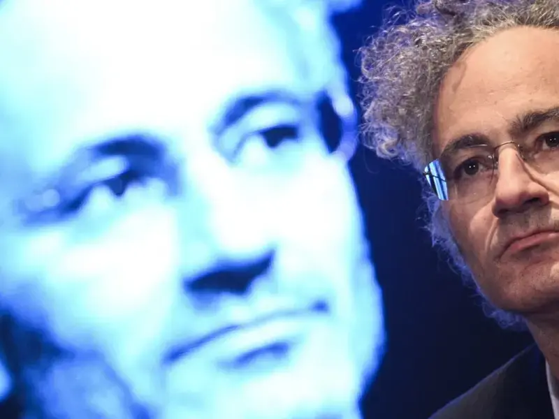 Se fossimo in un fumetto di supereroi, Alex Karp (e Palantir) sarebbe il villain che vuole conquistare il mondo